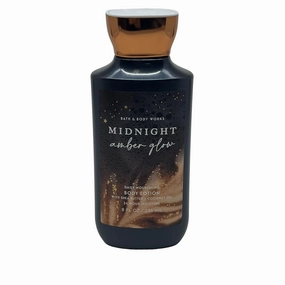 Bath and Body MIDNIGHT AMBER GLOW Daily Nourishing Body Lotion with Shea butter   Coconut Oil 8 fl oz pack of 1 Fragrance Notes: Smooth Amber, Caramel Latte, and Vanilla Bourbon