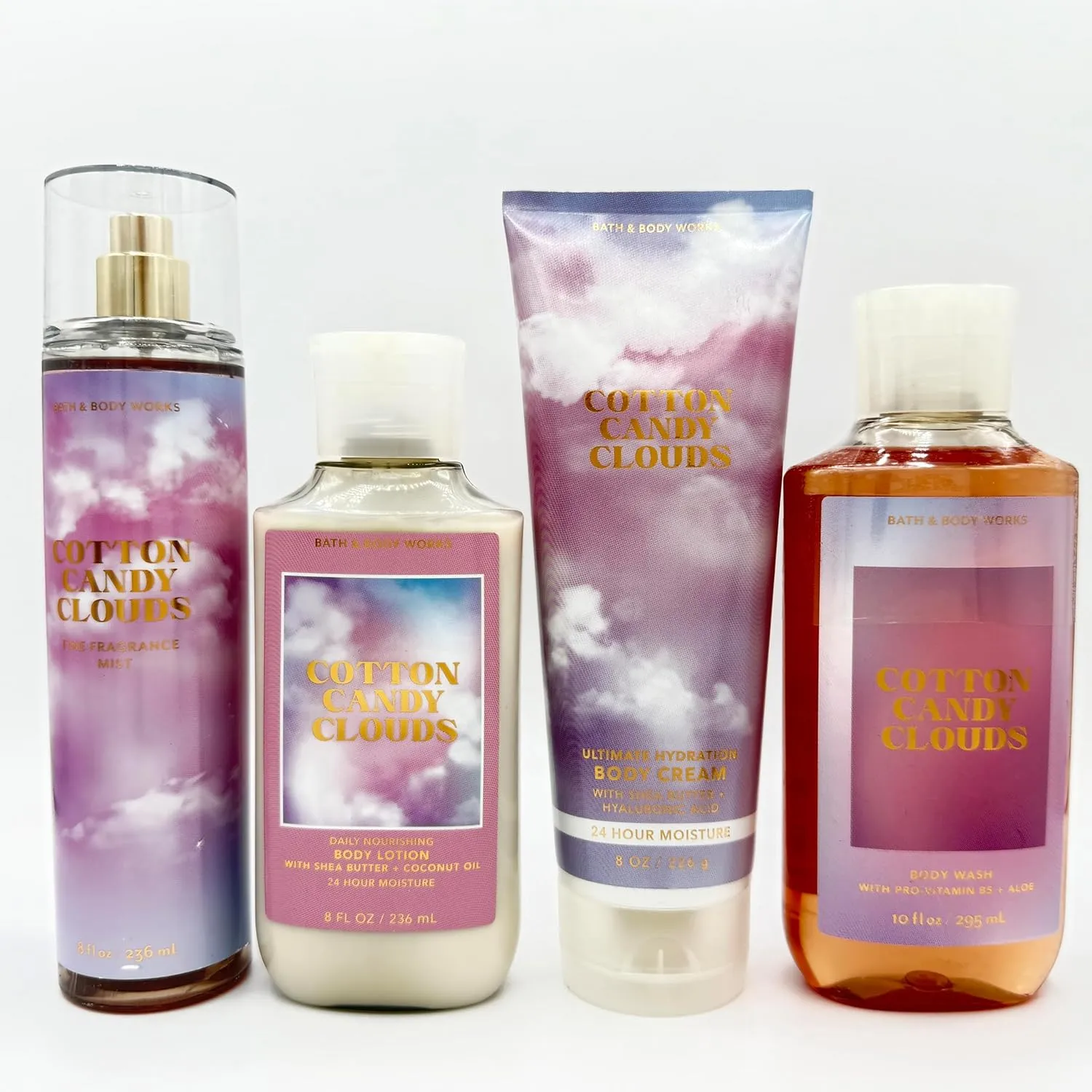 Cotton Candy Clouds 4-Piece Bath Bundle | Fine Fragrance Mist, Daily Nourishing Body Lotion, Ultimate Hydration Body Cream and Body Wash