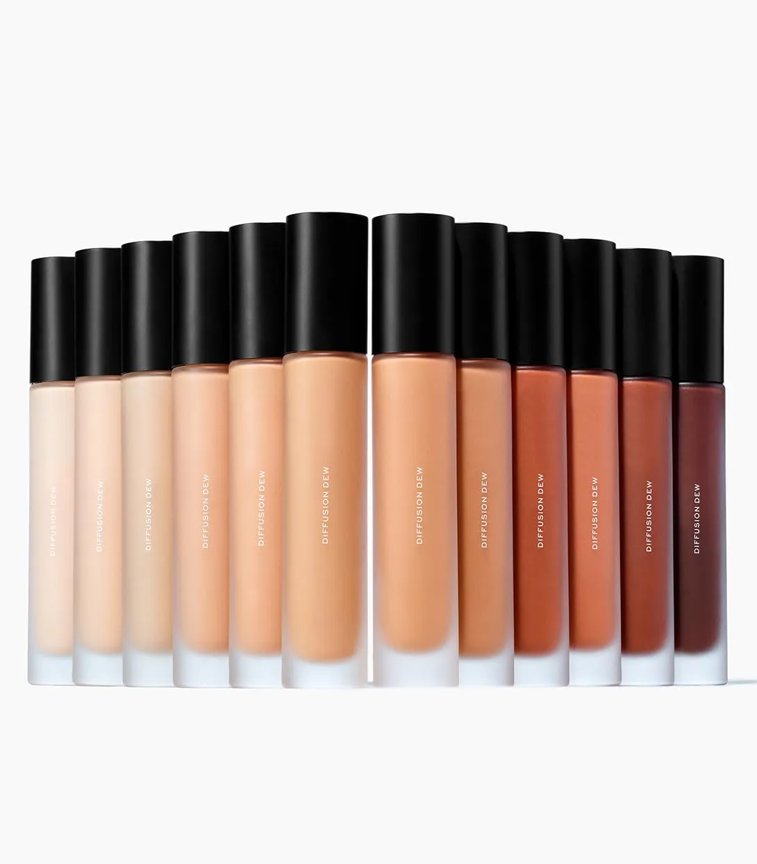 MAKE Beauty Diffusion Dew Skin Tint. Sheer to Medium Coverage Radiant Finish. Blurring, Smoothing, and Brightening for Glowing Complexion. Enhanced with Niacinamide and Adenosine. Espresso 20